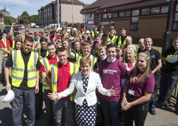 First Minister Nicola Sturgeon joins apprentices to announce £185 Million of new EIB investment for Wheatley Group.
