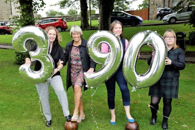 The 390th anniversary of the first recorded womens football match, which was played at Carstairs, is marked by, left to right, Scottish Womens Football chairperson Vivienne MacLaren, Rose Reilly, Aileen Campbell MSP and Karen Grunwell.