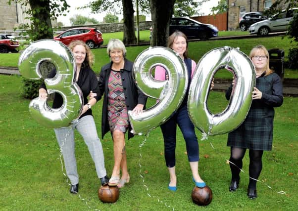 The 390th anniversary of the first recorded womens football match, which was played at Carstairs, is marked by, left to right, Scottish Womens Football chairperson Vivienne MacLaren, Rose Reilly, Aileen Campbell MSP and Karen Grunwell.