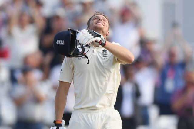 Jos Buttler celebrates after reaching his century. Picture: Stu Forster/Getty