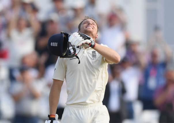 Jos Buttler celebrates after reaching his century. Picture: Stu Forster/Getty