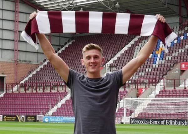 Jimmy Dunne sees the move to Hearts as a great opportunity to progress his career.