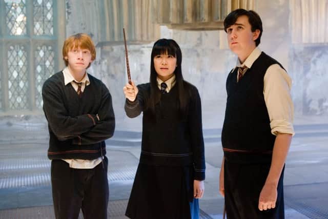 Rupert Grint as Ron Wesley, Katie Leung as Cho Chang and Matthew Lewis as Neville Longbottom in Harry Potter and the Order of the Phoenix