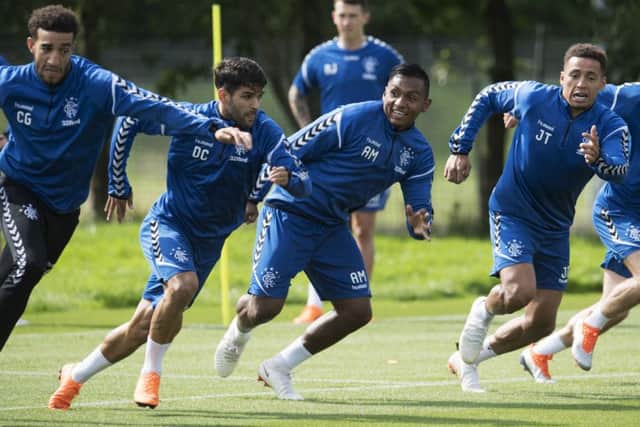 Rangers forward Alfredo Morelos, centre, is all smiles in training ahead of the club's Europa League play-off tie versus Ufa. Picture: Craig Foy/SNS