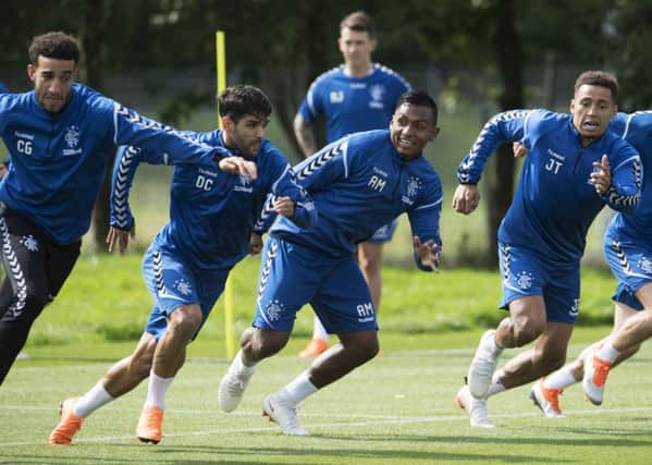 Rangers forward Alfredo Morelos, centre, is all smiles in training ahead of the club's Europa League play-off tie versus Ufa. Picture: Craig Foy/SNS
