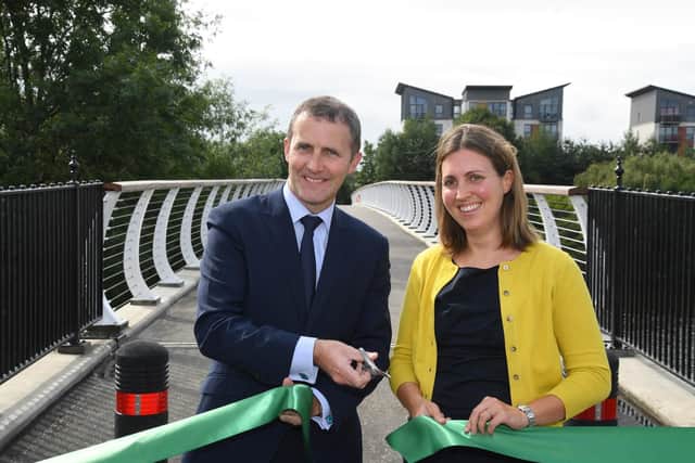 Transport secretary Michael Matheson opens the bridge with Glasgow city councillor Anna Richardson. Picture: Glasgow City Council