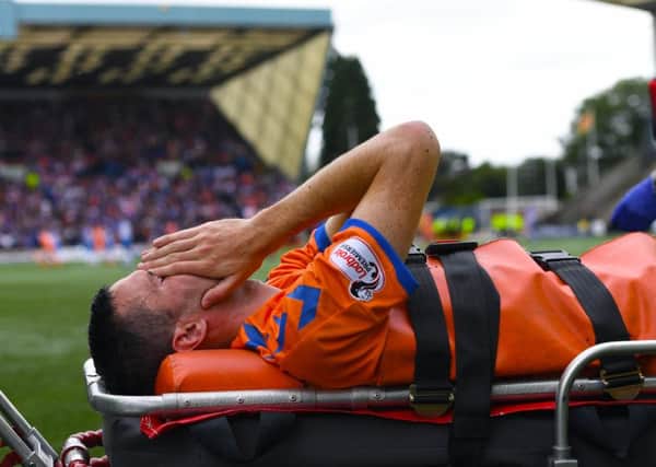 Rangers' Jamie Murphy is stretchered off at Rugby Park. Picture: Craig Williamson/SNS