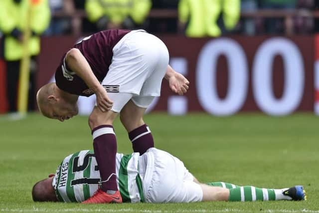 Hearts' Steven Naismith shouts in the face of Celtic's Jonny Hayes. Picture: SNS/Rob Casey