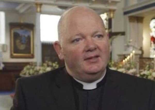 Canon Tom White.