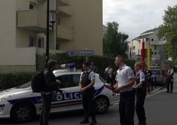 Police at the scene of a knife attack in the suburb of Trappes, west of Paris. Picture: AP