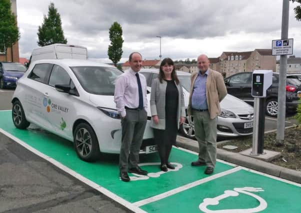 A new Renault Zoe electric car at a charging point at the Ore Valley Business Centre
