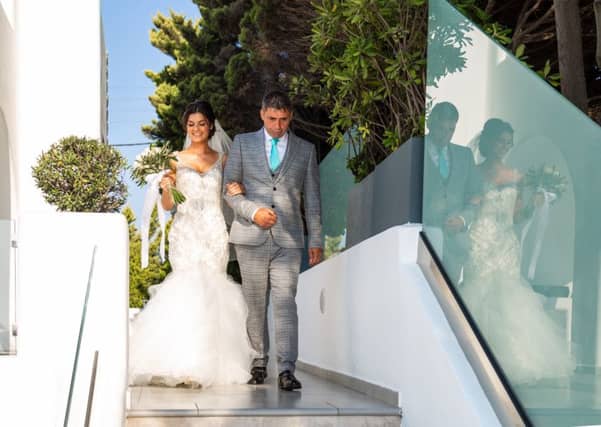 Lyndsey and Sean Henderson, on their wedding day. Picture: SWNS