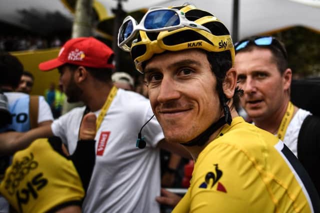 Tour de France winner Great Britain's Geraint Thomas wearing the overall leader's yellow jersey smiles after the 21st and last stage of the 105th edition of the Tour de France cycling race between Houilles and Paris Champs-Elysees. Picture: MARCO BERTORELLO/AFP/Getty Images.