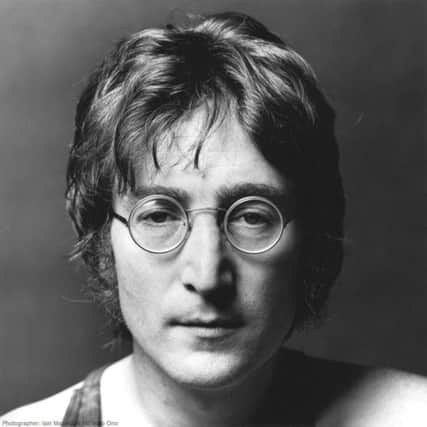 21st May 1971: Ex-member of the Beatles, singer and songwriter John Lennon (1940 - 1980) on the beach at Cannes, France. (Photo by Central Press/Getty Images)