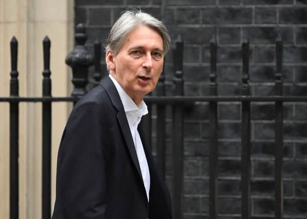 Britains Chancellor of the Exchequer Philip Hammond leaves 11 Downing street on 18 July 2018. (Photo by Chris J Ratcliffe/Getty Images)
