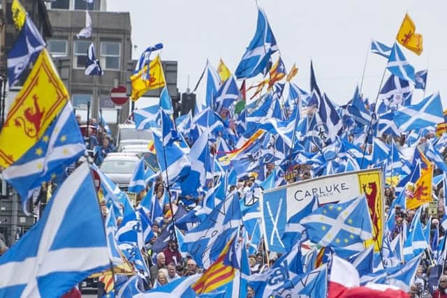 Independence supporters join the All Under One Banner march in Glasgow in May. Picture: John Devlin