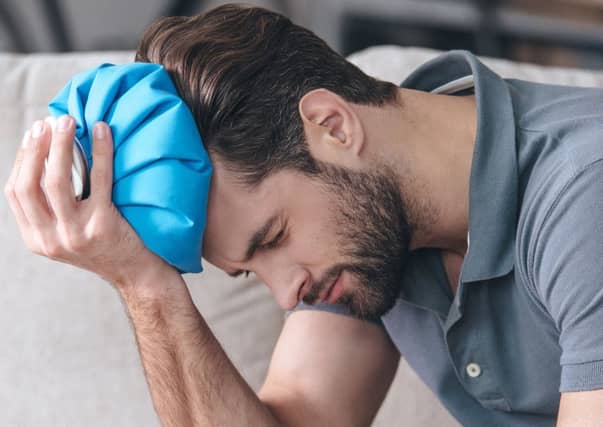 Hangovers cost the UK economy £1.9 billion a year due to absenteeism. Inset: Dr Sally Adams. Photograph: Getty