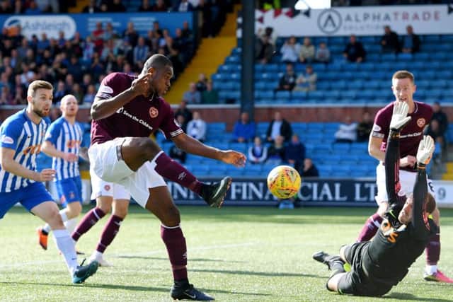 Jamie MacDonald saves a shot from Uche Ikpeazu. Pic: SNS/Craig Williamson