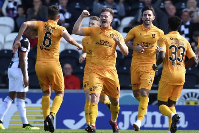 Livingston's Alan Lithgow celebrates making it 2-0. Pic: SNS/Rob Casey