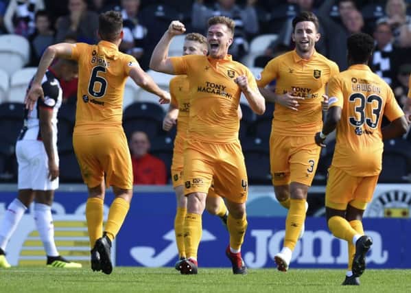 Livingston's Alan Lithgow celebrates making it 2-0. Pic: SNS/Rob Casey