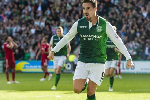 Hibernian's Jamie MacLaren celebrates scoring the equaliser. Pic: SNS/Alan Harvey