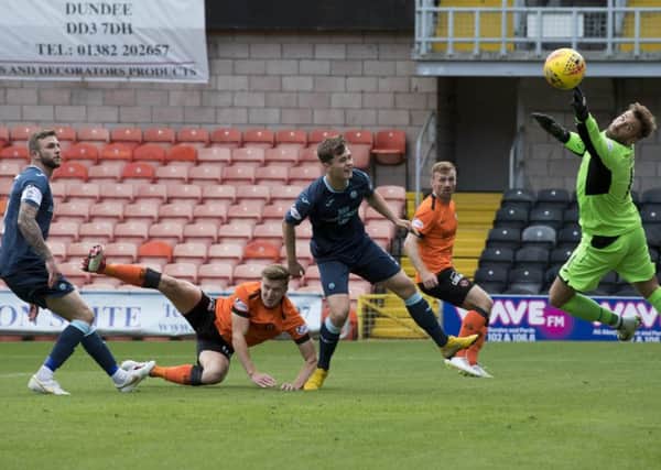 Paul Watson (centre) scores to make it 1-0. Pic: SNS/Bill Murray
