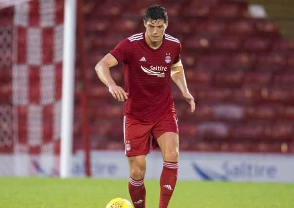 Aberdeen defender Scott McKenna is a target for Celtic. Picture: SNS
