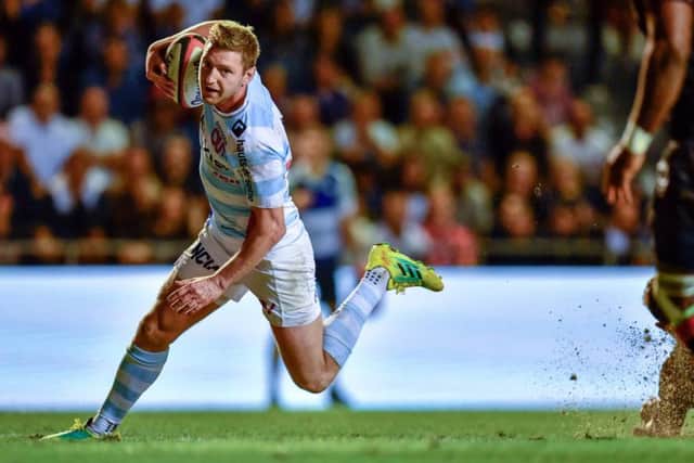 Finn Russell runs in to score one of his two tries for Racing 92 in Saturday nights victory over Toulon. Picture: AFP/Getty.