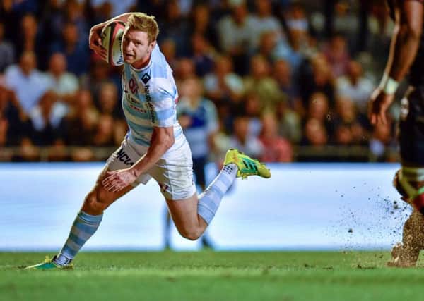 Finn Russell runs in to score one of his two tries for Racing 92 in Saturday nights victory over Toulon. Picture: AFP/Getty.