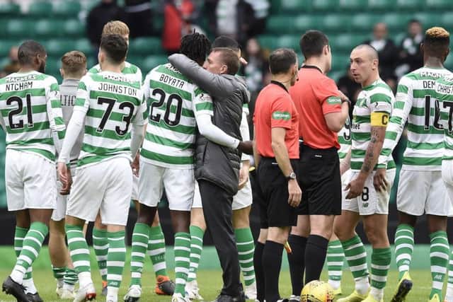 Celtic manager Brendan Rodgers gives goalscorer CelticÃ¢Â¬"s Dedryck Boyata a hug after the Ladbrokes Scottish Premiership match at Celtic Park, Glasgow. PRESS ASSOCIATION Photo. Picture date: Sunday August 26, 2018. See PA story SOCCER Celtic. Photo credit should read: Ian Rutherford/PA Wire. EDITORIAL USE ONLY