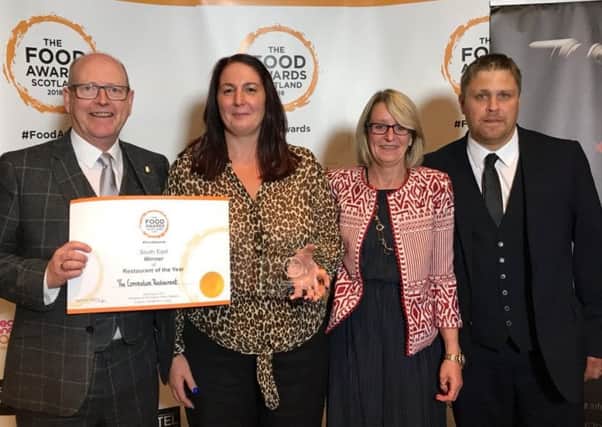 Staff from the Coronation restaraunt in Gorebridge with their Food Awards Scotland regional certificate and national award.