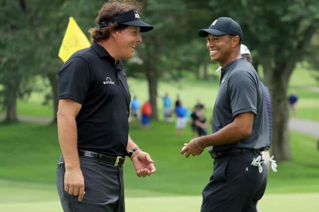 The big-money match between Phil Mickelson, left, and Tiger Woods is more likely to damage golf than enhance it. Picture: Getty.