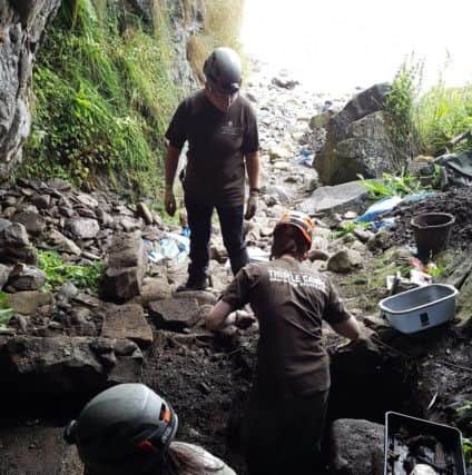 Part of a medieval doorway has been found to the caves, which NTS hope to open up to the public. PIC: NTS.