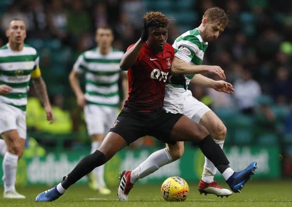 Aaron Tshibola in a match against Celtic last season. Picture: Getty
