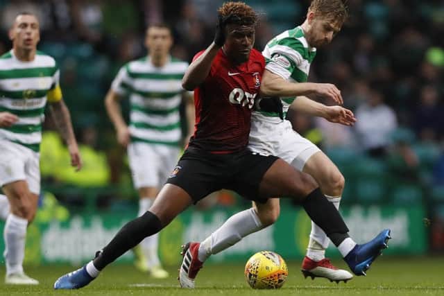 Aaron Tshibola in a match against Celtic last season. Picture: Getty