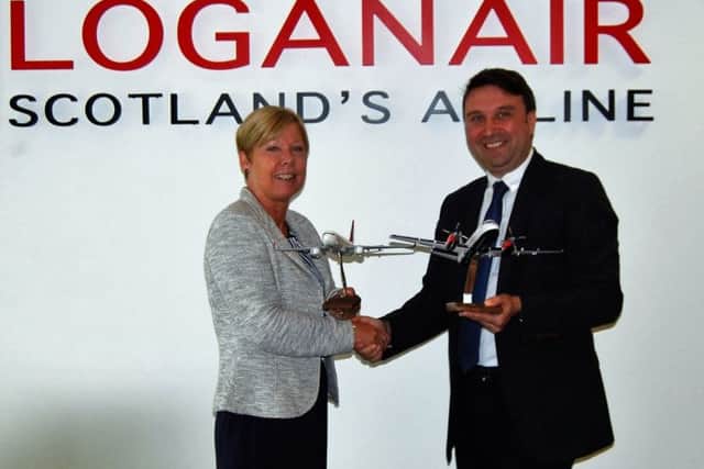 Loganair commercial director Kay Ryan with Turkish Airlines Scotland general manager Gokhan Haciibrahimoglu. Picture: Contributed