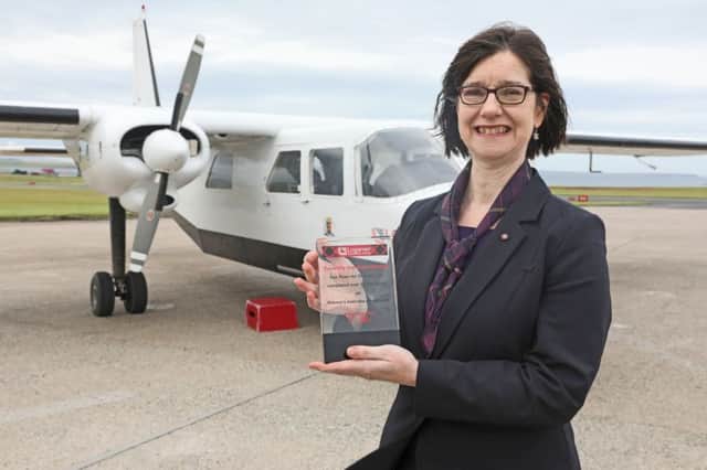 Anne Rendall, who has taken more than 11,000 flights in her role as mobile banker serving the Orkney Islands. Picture: Orkney Photographic/PA Wire
