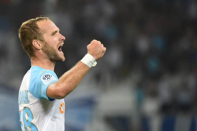 Marseille forward Valere Germain, seen celebrating a goal in a Ligue 1 clash with Toulouse, isn't keen on swapping France for Glasgow. Picture: Getty Images