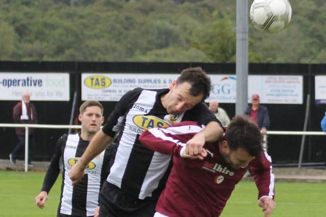 Saturday 3rd September
Threave Rovers v linlithgow Rose
Threave's No.5 Scott Wilby out jumps Linlithgow's No.10 Thomas Coyne