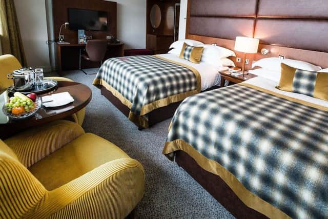 Two double beds in a family room at Macdonald Manchester Hotel
