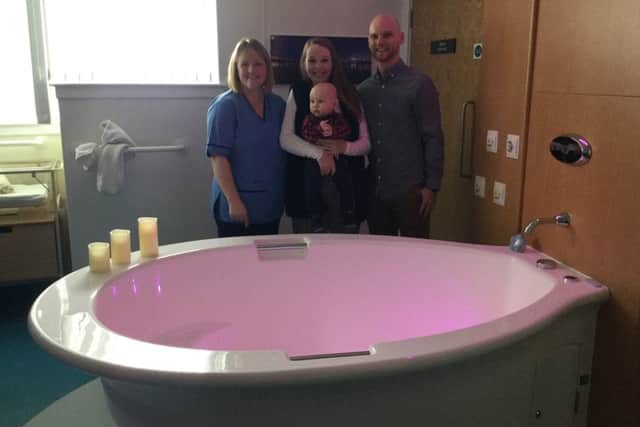 Zoe, Gary and Theo Patterson with midwife Natalia Latham at the birthing pool Theo was born in