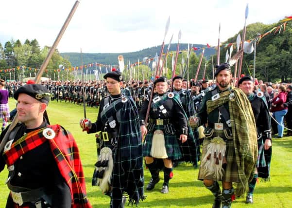 The Lonach Highlanders arrive in the arena at Strathdon following their six-mile march through the surrounding villages.  PIC: Contributed.