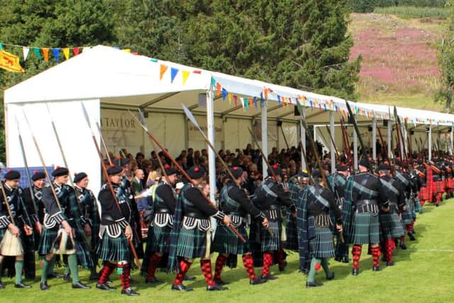 More than 220 Lonach Highlanders take part in the march with the men all having a family link to the area and the role often passed down through the generations. PIC: Contributed.
