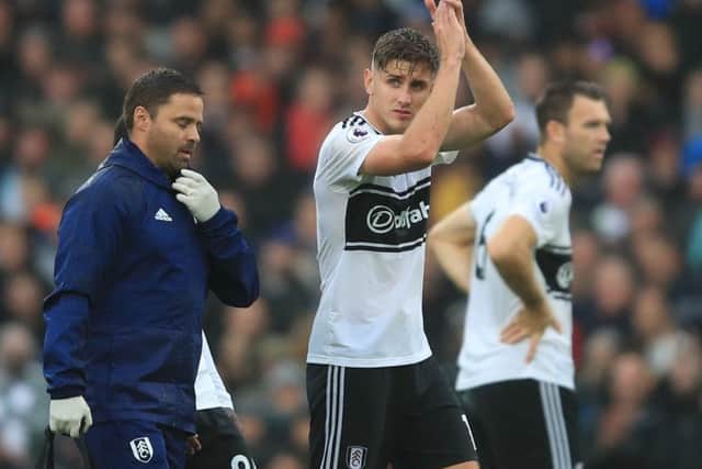 Tom Cairney of Fulham reacts after being injured during the Premier League match against Burnley. Picture: Marc Atkins/Getty Images