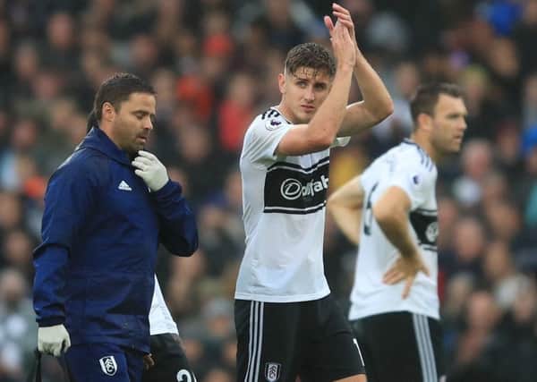Tom Cairney of Fulham reacts after being injured during the Premier League match against Burnley. Picture: Marc Atkins/Getty Images