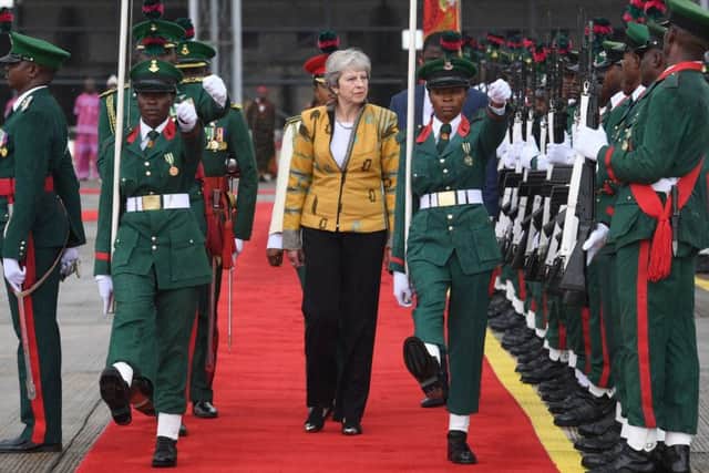 Prime Minister Theresa May arrives in Abuja, Nigeria, on day two of her trip to Africa as David Lidington warned the EU over the Chequers deal. Picture: Stefan Rousseau/PA Wire