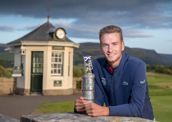 Frenchman Victor Veyret shows off the Carrick Neill Scottish Open Stroke Play Championship trophy after his win at Gleneagles. Picture: Kenny Smith