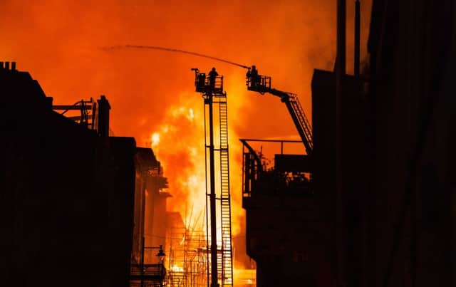 Firefighters battle to contain the fire that destroyed the Mackintosh building at Glasgow School of Art in June. Picture: John Devlin