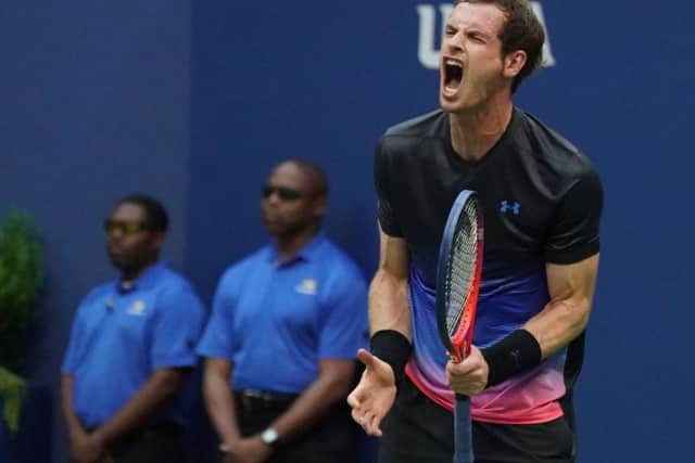Andy Murray was unhappy when he spotted Fernando Verdasco yalking to his team during the heat break contrary to the rules. Picture: AFP/Getty