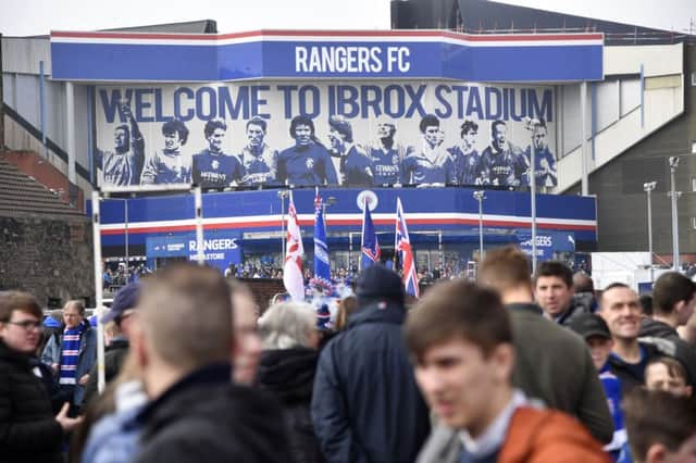 A general view of fans outside Ibrox Stadium. Picture: SNS Group